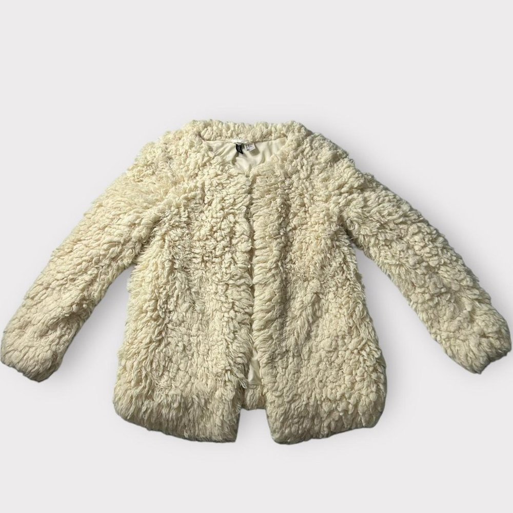 Cream coquette faux fur/faux sherpa jacket. Size Medium